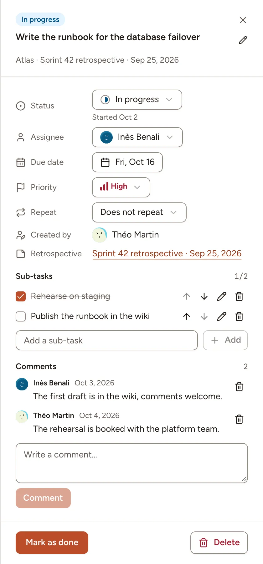 The details of an action item: its fields, two sub-tasks and two comments