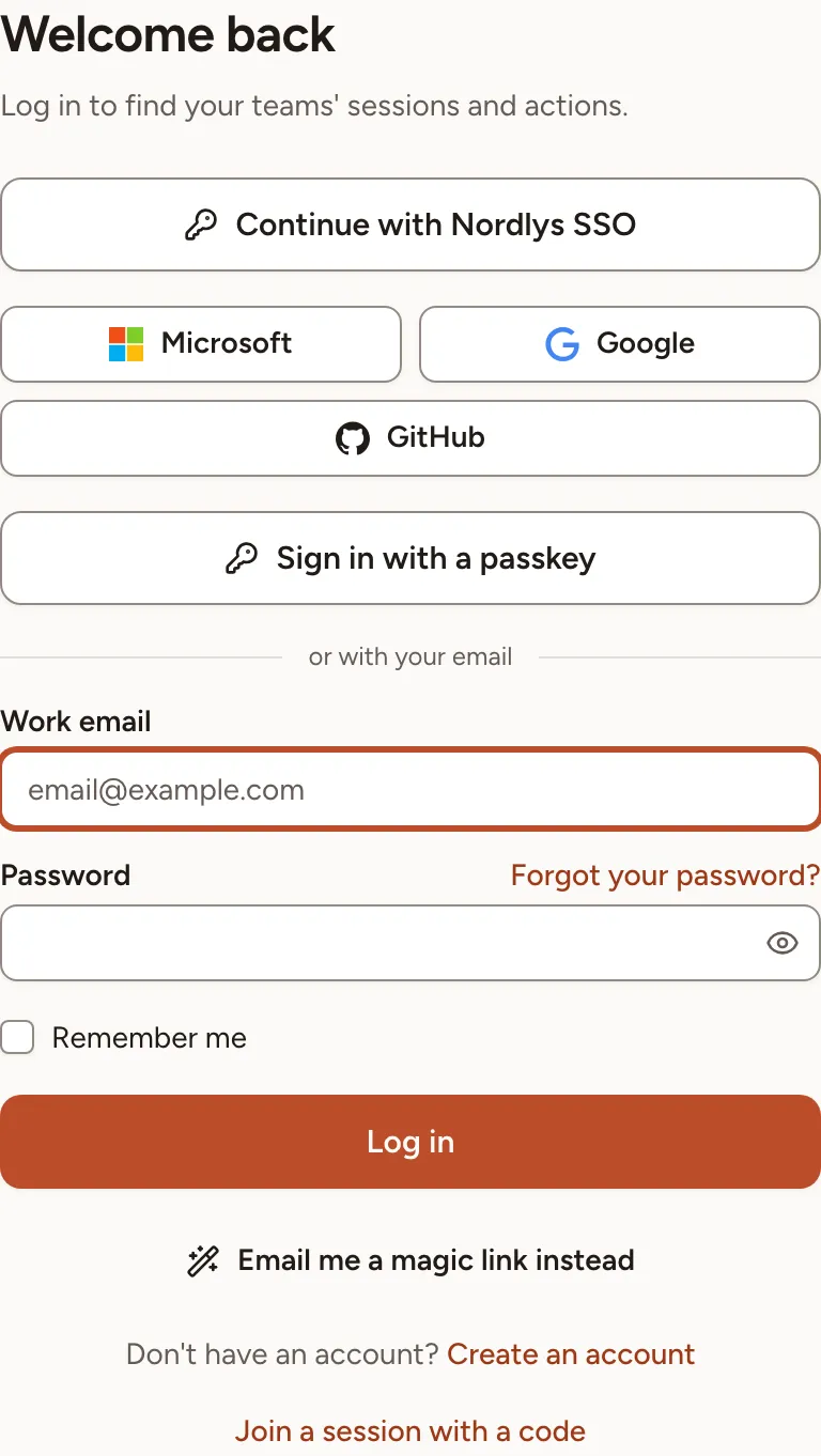 The sign-in page with the company account buttons, the passkey button, the email and password form and the magic link button
