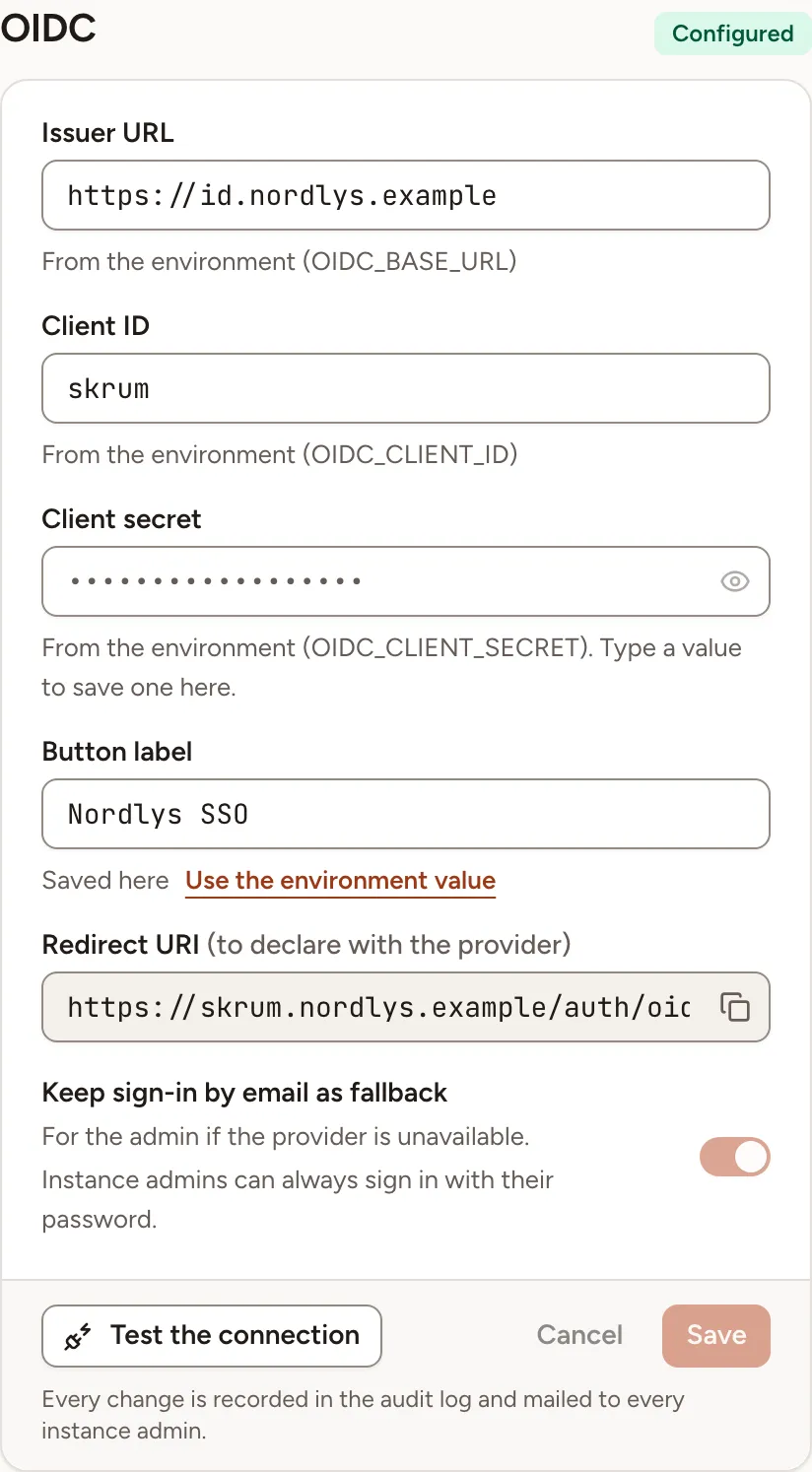 The OIDC card: issuer, client ID and secret from the environment, a button label saved in Administration, the redirect URI and the connection test