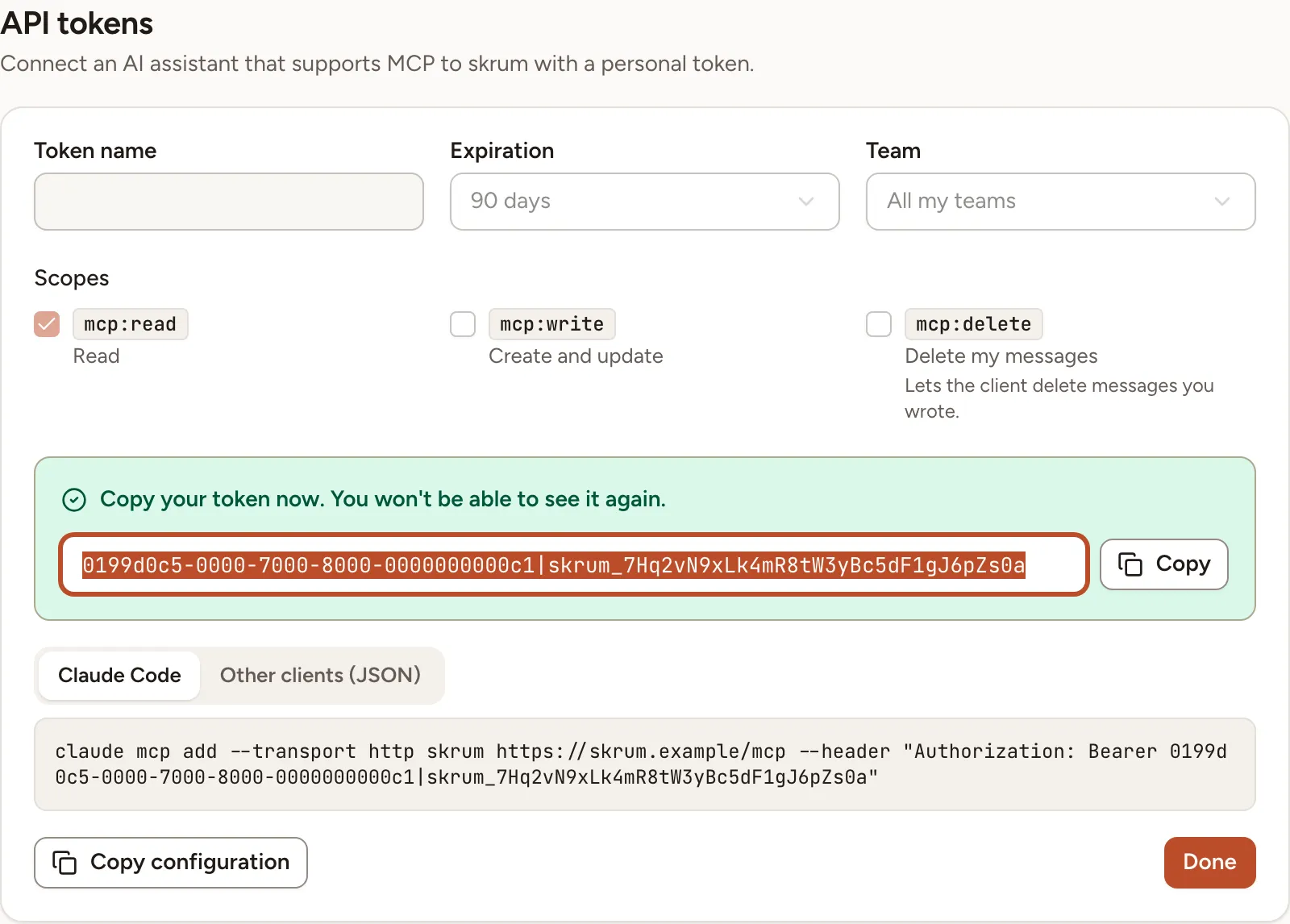 The API tokens card after a token was created, with the token to copy and the configuration for Claude Code